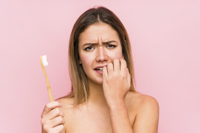 woman with toothbrush